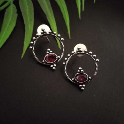 Round pink studs