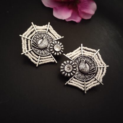 Pearl bird studs -1
